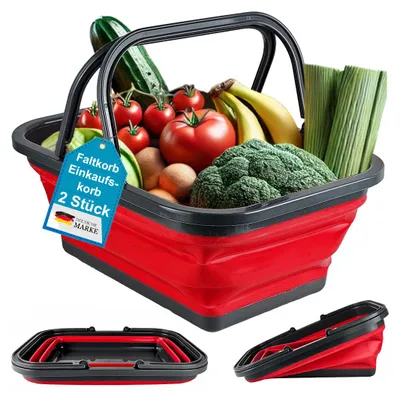 A red and black foldable shopping basket filled with various fresh produce, including tomatoes, bananas, broccoli, leeks, and a cucumber. The basket is shown from a slightly elevated angle, with two smaller inset images showing the basket folded.