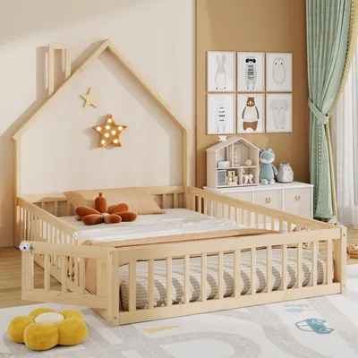 A child's bedroom with a wooden house-shaped bed.