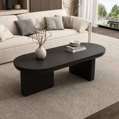 A modern living room scene with a couch and coffee table.