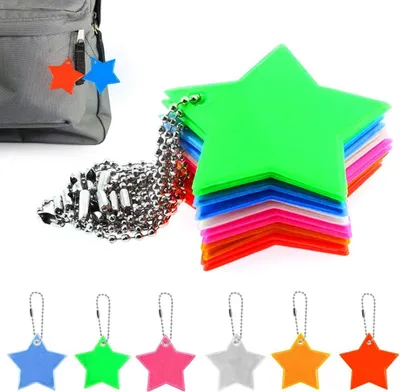 Produktbild von Mmgoqqt Sicherheitsreflektoren Stern, 18 Stück, 5.5cm, PVC, Wetterfest & UV-beständig. Ideal für Kinder, Schultaschen, Rucksäcke, Radfahrer, Fußgänger, Läufer zur erhöhten Sichtbarkeit an Kleidung, Taschen, Kinderwagen, Hunde & Rollstühle – bis 200m Sichtweite. Hellblau, Orange, Rosa, Silberweiß, Rot, Grün.