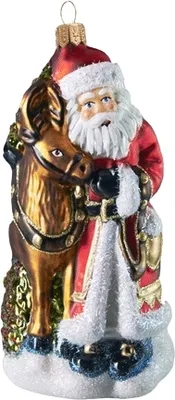 A Christmas ornament depicting Santa Claus with a reindeer.