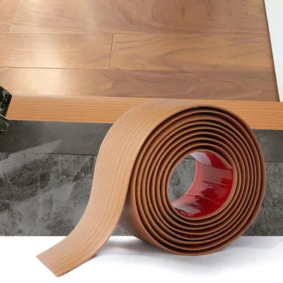 Obrázek produktu pro Samolepicí přechodová lišta z PVC pro laminátové podlahy