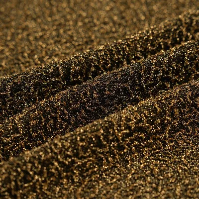 Imagen del producto de Tejido de punto Jacquard color dorado, 160 cm de ancho – Producto propio de MT