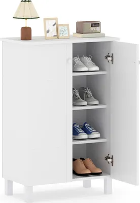 A white shoe cabinet with its doors open, displaying shoes on its shelves.