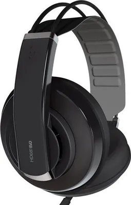 A studio shot of a pair of black headphones against a white background.