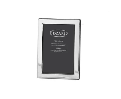 A silver picture frame with text on the dark gray insert.