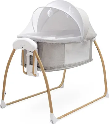 A baby bassinet with a canopy and a mobile.