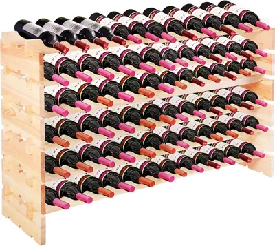 A wooden wine rack filled with many bottles of wine.
