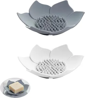 Produktbild von Set mit 2 Silikon-Seifenschalen in Blütenform – integrierter Abfluss, rutschfest, für Bad/Küche (weiß/grau)