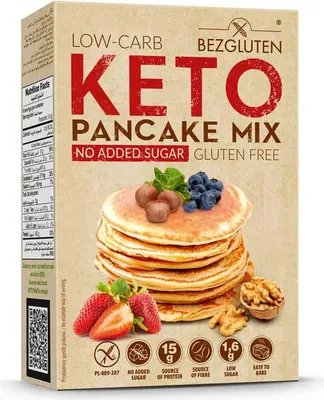 A box of Bezgluten Keto Pancake Mix with an image of pancakes, strawberries, blueberries, hazelnuts, and walnuts.