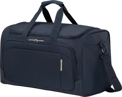 A studio shot of a navy blue duffel bag.