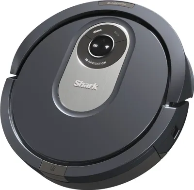 A top-down view of a gray Shark robot vacuum cleaner against a light gray background.