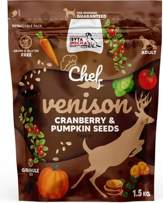 A bag of dog food with illustrations of ingredients and a deer.