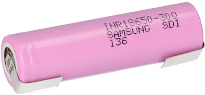 A single pink battery with silver metal contacts on a white background.