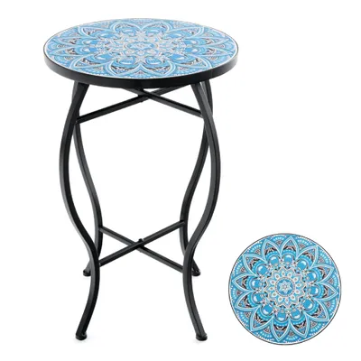 A round mosaic side table with a blue and white patterned top and a black metal base, shown with a separate close-up of the mosaic pattern.