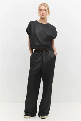 Produktbild von Weit geschnittene Jogginghose mit elastischem Bund, Black Glitter, M