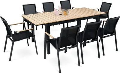 A dining set with a wooden table and eight black chairs.