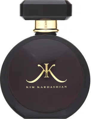 A perfume bottle with a black, round body and a faceted black cap with gold accents.