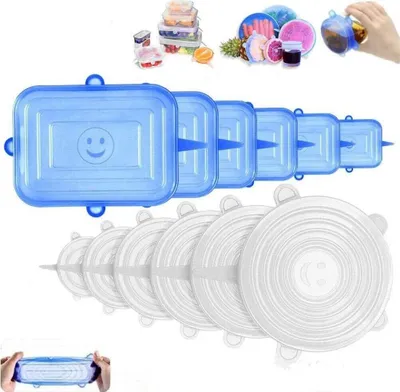 A collection of blue square and white round silicone lids for food storage, arranged in rows.
