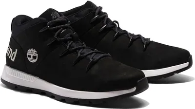 A pair of black Timberland Sprint Trekker Mid shoes on a white background.