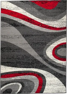 A close-up view of a rug with a modern abstract design.