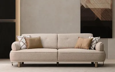 Immagine prodotto di Elegante divano beige con cuscini per ogni soggiorno