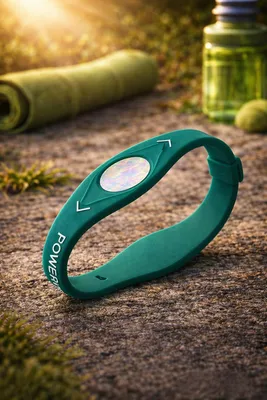 Produktbild von Power Balance Energie Armband – Ionenband für Fitness & Alltag grün M – 19 cm