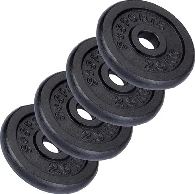 Four black weight plates stacked diagonally against a white background.