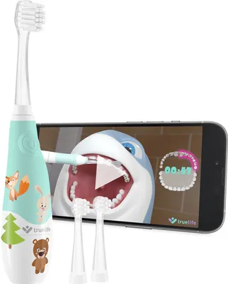 A children's electric toothbrush with cartoon animal designs is shown next to a smartphone displaying an animated video about brushing teeth.