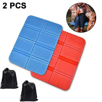 Two foldable outdoor seat cushions, one blue and one red, with two black drawstring bags.