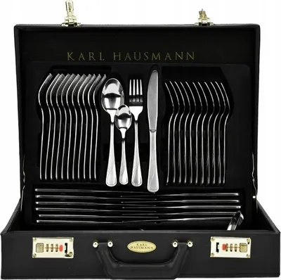 A Karl Hausmann cutlery set displayed in its case.