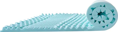 A light blue foam mattress topper is shown unrolled on a white background, with one end rolled up.