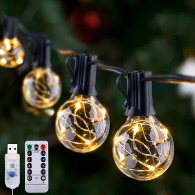 Productafbeelding van Verlichtingstouw voor binnen en buiten, 9,6 meter lang, met 25 LED lampen (G40), 8 lichtmodi, waterdicht. Geschikt voor decoratie buiten, met USB-aansluiting en afstandsbediening. Ideaal voor in huis, op het balkon, in de tuin of in de tuin. Warmwit licht