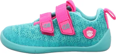 A side view of a child's shoe.