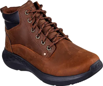 A single brown leather boot with black accents and a black sole, shown from a side-angle on a white background.