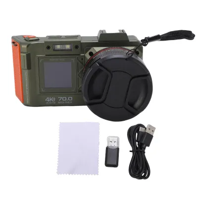 A digital camera and its accessories are laid out on a white background.