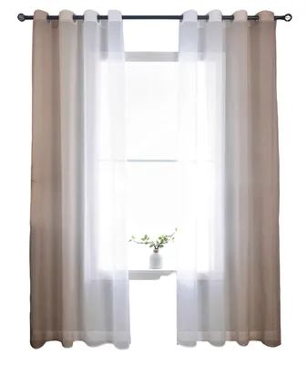 A window with curtains and a small plant on the windowsill.