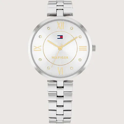 A close-up studio shot of a Tommy Hilfiger watch.