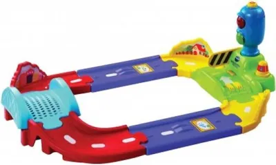 A toy road set with a traffic light.