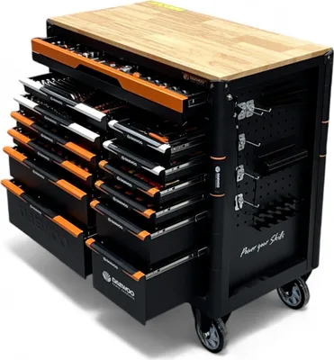 A fully stocked tool chest with many drawers and a wooden top, shown from a slightly elevated front-diagonal angle.