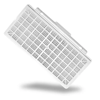 A white plastic filter basket with a grid pattern.