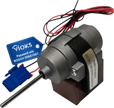 A close-up shot of a small electric motor with wires and a blue connector, along with a blue tag attached to it.