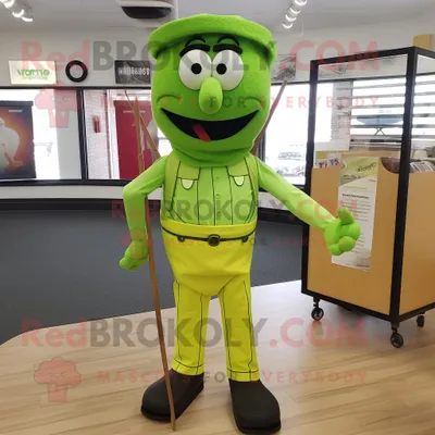 Obrázok produktu pre Postava maskota REDBROKOLY, Lime Green Knife Thrower, oblečená v kostýme pozostávajúcom z nohavíc a podväzkov
