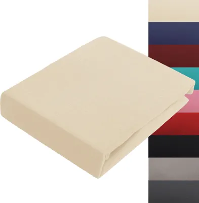 A folded beige fitted sheet is shown on a white background, with a color swatch strip on the right.
