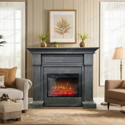 A living room scene featuring a gray electric fireplace with a fire effect, flanked by a sofa and a floor lamp.