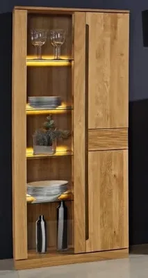 Produktbild von Vitrine Arcona 80x199 massive Wildeiche Riffelfront mit 1 Glastür und 1 Holztür