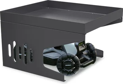 A robotic mower garage with a robotic mower underneath.