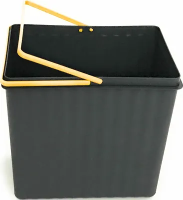 A black bucket with a yellow handle is shown against a white background.