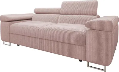 A studio shot of a pink sofa against a white background.