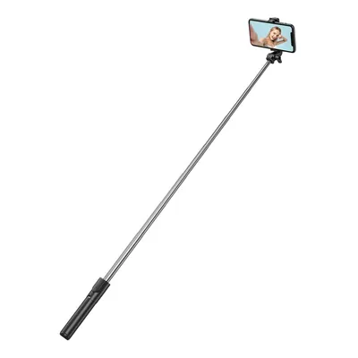 A selfie stick with a phone attached, showing a person taking a selfie.